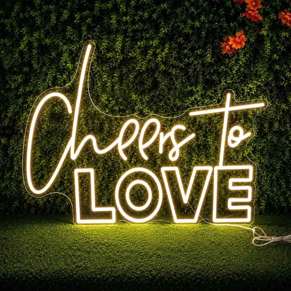 Cheers to Love neon sign at a wedding