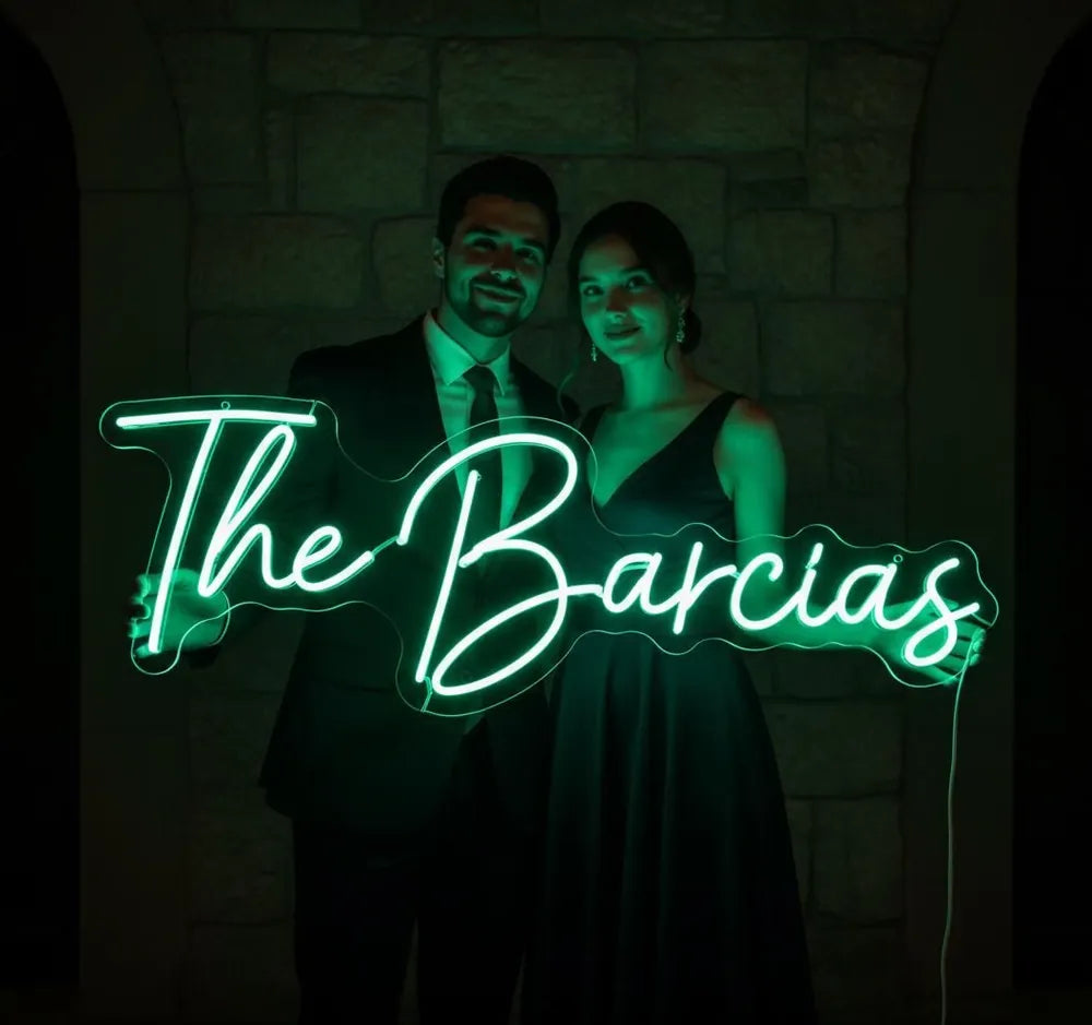 The Barcias neon sign — family name in illuminated lettering